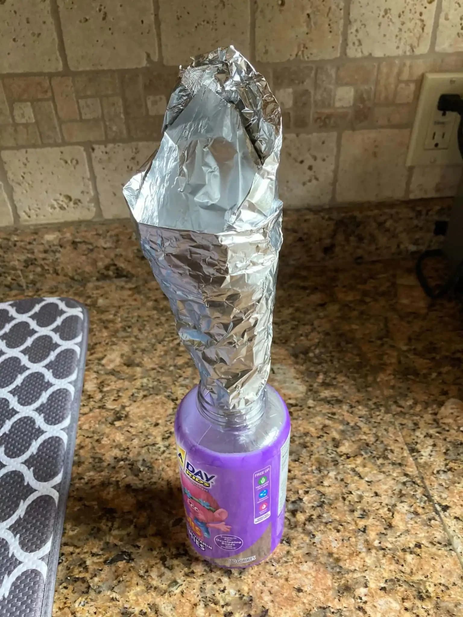 Try Using An Aluminum Foil As A Funnel